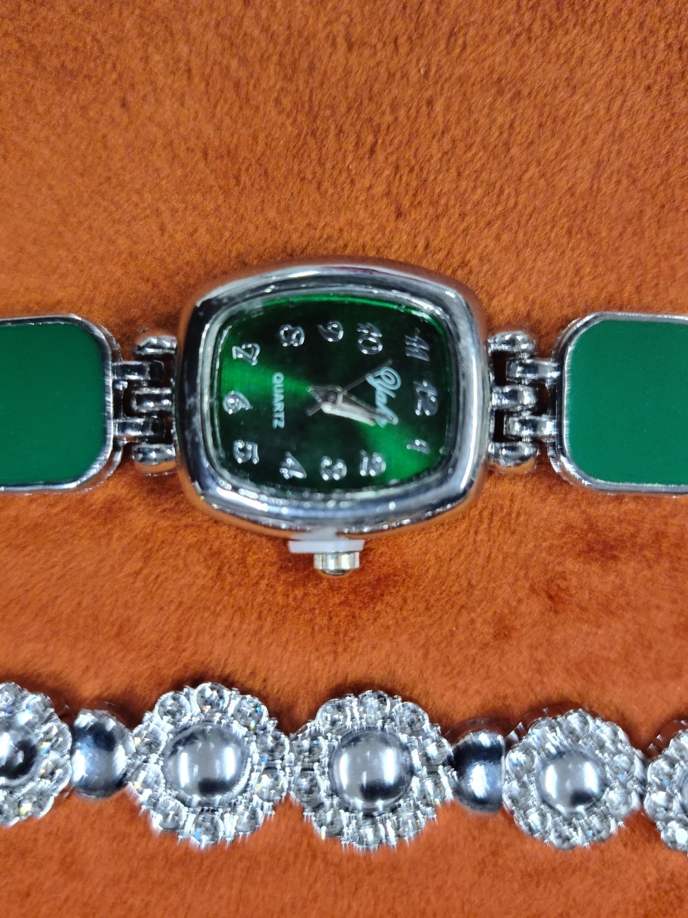 Green Dial Silver Bracelet And A Watch